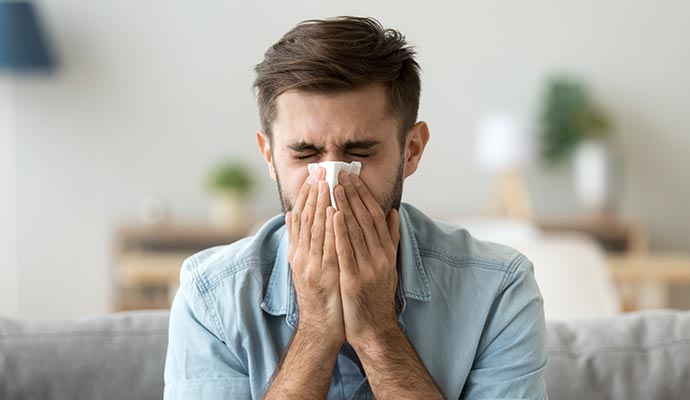 A person sneezing