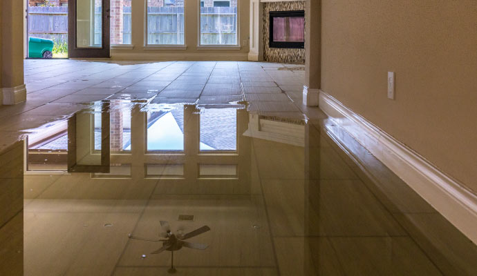 Flooded tiled floor in the living room