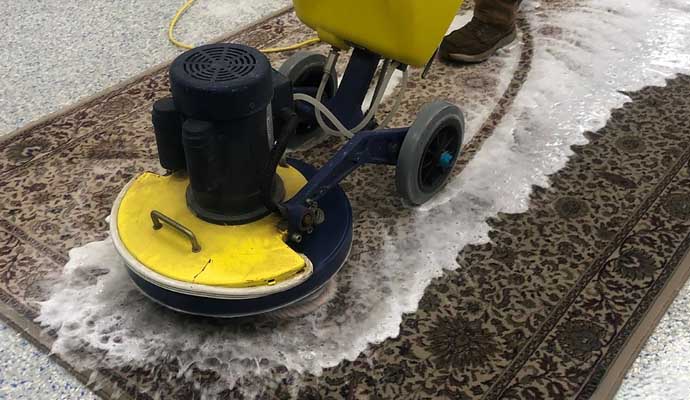 area rug cleaning with scrubbing machine