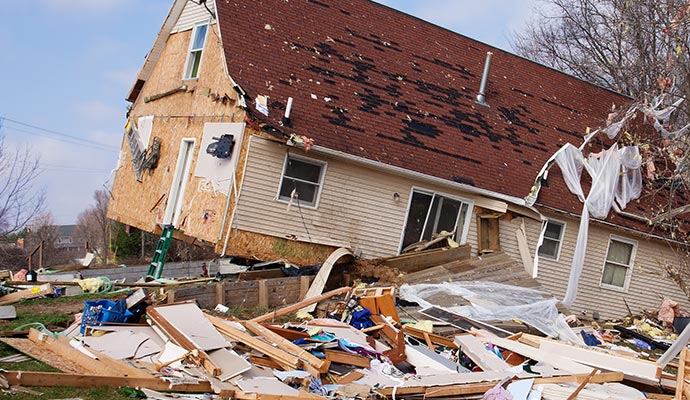 Severely damaged house due to storm